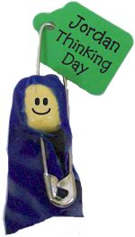 a blue bag with a smiley face holding a green sign that says jordan thinking day