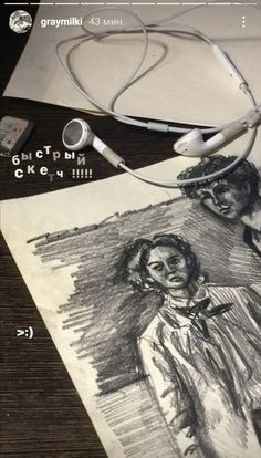 a drawing is shown with headphones on the table