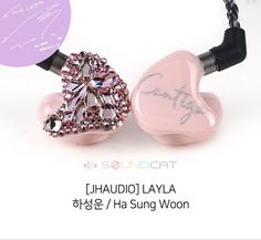 two pink heart shaped earphones with swarong woon