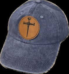 You will receive this attractive, adjustable unisex hat.  This blue colored distressed hat has a round leatherette patch laser engraved with the 2 nails forming the Cross.   This hat is a perfect way to openly express your Christian faith.  One size fits most.  Please handwash since it has a leatherette patch. OhioBasketChic designs many customizable products and very special gift baskets.  Please message us about bulk orders or customizations. Distressed Flat Brim Hat With Adjustable Fit, Distressed Adjustable Flat Brim Hat, Adjustable Fitted Hat With Leather Patch And Curved Brim, Distressed Dad Hat With Adjustable Curved Brim, Distressed Adjustable Dad Hat With Curved Brim, Baseball Cap With Leather Patch And Curved Bill, Curved Bill Hat With Leather Patch, Vintage Cap With Leather Patch, Distressed Adjustable Baseball Cap With Curved Brim