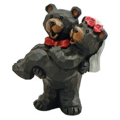 a couple of bears that are sitting on top of each other