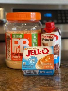 ingredients for peanut butter and jelly sitting on a counter