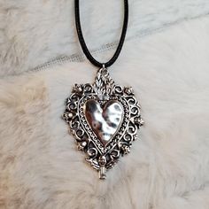 Vintage Style Large Heart Angel Fairy Charm Necklace. Charms Are Approximately 39x41mm. Comes On A 17.5 Inch Black Rope Cord With A Lobster Clasp And 1.5 Inch Extension Chain. #Heart #Silver #Vintage #Goth #Punk Gothic Heart Shaped Necklace As Gift, Gothic Heart Shaped Necklace For Gifts, Gothic Heart Necklace As Gift, Gothic Heart Charm Necklace For Gift, Gothic Silver Heart Necklace For Valentine's Day, Gothic Silver Heart Pendant Necklace, Silver Gothic Heart Necklace For Valentine's Day, Gothic Silver Heart Charm Necklace, Silver Gothic Heart Charm Necklace