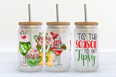 three christmas themed mason jars with straw tops