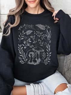 FREE SHIPPING!   PRODUCT DETAILS: *Ideal for any situation, this unisex crewneck sweatshirt offers pure comfort. *Made from medium-heavy fabric (8.0 oz/yd² or 271.25 g/m²). *Unisex, Loose fit.  *Composed of 50% Cotton for softness and 50% Polyester to resist stretching and shrinking. *No itchy side seams. *The ribbed knit collar with seam helps retain its shape. CARE INSTRUCTIONS: Machine wash cold (max 30oC or 90oF) on a delicate cycle. Use non-chlorine bleach as needed. Tumble dry on low heat. Casual Crew Neck Sweatshirt With Mushroom Print, Cotton Crew Neck Sweatshirt With Mushroom Print, Relaxed Fit Fall Tops With Mushroom Print, Relaxed Fit Mushroom Print Top For Fall, Relaxed Fit Top With Mushroom Print For Fall, Fall Mushroom Print Crew Neck Sweatshirt, Fall Crew Neck T-shirt With Plants Print, Botanical Relaxed Fit Tops For Fall, Cotton Sweatshirt With Mushroom Print