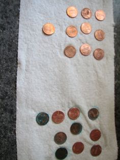 a roll of toilet paper covered in coins