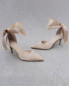 "An all-time classic and simplicity of satin pointy toe heels with satin ribbon ankle tie. Simple yet elegant are great combination and will definitely be a favorite. DETAILS: HEELS: 3 inches COLORS AVAILABLE: Black, Burgundy, Champagne, Dusty Pink, Light Blue, Ivory, and White UPPER: Synthetic upper and lining MATERIALS: Mandmade outsole ORIGIN: Imported STYLE NAME: BELL Not sure of which size to purchase? Shoes measurements are as follow: (Please note measurements taken the length of inside of Fall Wedding Shoes, Black Evening Shoes, Pageant Shoes, Champagne Shoes, Bridesmaids Shoes, Evening Heels, Holiday Shoes, Pointy Toe Heels, Pointy Toe Flats