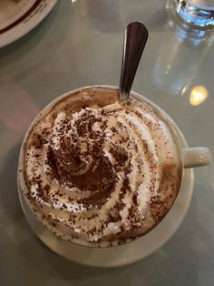 a cup of hot chocolate with whipped cream