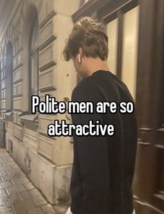 a man standing in front of a building with the words polite men are so attractive