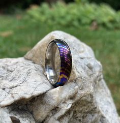 a ring sitting on top of a rock