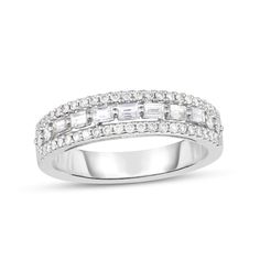 Whether it's your first or your fiftieth, this diamond anniversary band is a great way to show her she's still the one. Created in 14K white gold, this open-worked style features a row of baguette-cut diamonds shimmering between round-diamond borders. Captivating with 5/8 ct. t.w. of diamonds and a bright polished shine, this comfort-fit ring simply sparkles. Anniversary Bands With Wedding Ring, Anniversary Bands For Her Stackable, Diamond Anniversary Bands, Art Deco Wedding Band, Wedding Rings Round, Diamond Anniversary, Baguette Cut Diamond, Anniversary Bands, Diamond Stone