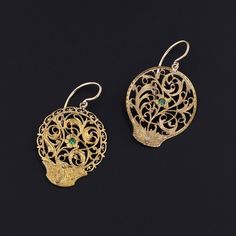 These slightly mismatched earrings were converted from antique Georgian watch cocks (circa 1780-1800) by adding 14k gold ear wires and tsavorite garnet to the gold gilt dangles. Each earring measures 1.25 inches from the top of the ear wire to bottom by 0.8 inches wide, and they are in great condition. Materials: tsavorite garnet, gold gilt, 14k. Tsavorite Garnet, Antique Watches, Mismatched Earrings, Find Beauty, Ear Wire, Jewelry Findings, Antique Jewelry, Garnet, Vintage Antiques