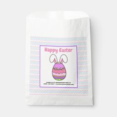 a white paper bag with an easter egg on the front and happy easter written in pink