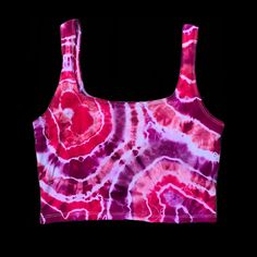 Pink geode tie dye crop tanked top!  This item is MADE TO ORDER ! This means that it will likely look slightly different than the one pictured, because no two tie dyes are exactly the same! The same colors and design will be used of course:) SIZES OFFERED  *All Tank top designs are available in sizes small, medium, XL , 2XL  *all crop tops can be made as a full length tank!  *If you need a size that is not offered , or want a design in a child's size, feel free to message me!  *If want the desig Pink Tank Top For Summer Festivals, Fitted Acid Wash Crop Top For Summer, Summer Festival Pink Tank Top, Fitted Tie Dye Cotton Tank Top, Tie Dye Fitted Cotton Crop Top, Fitted Cotton Tie Dye Tank Top, Fitted Tie Dye Crop Top For The Beach, Fitted Tie Dye Cotton Crop Top, Fitted Tie Dye Crop Top For Festivals