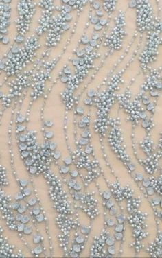 beaded fabric with pearls on it