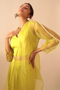 Shop for Vanshika Agarwal Yellow Modal Satin Ashley Organza Jacket And Draped Skirt Set for Women Online at Aza Fashions Yellow Long Sleeve Dress For Reception, Elegant Organza Lehenga For Summer, Elegant Summer Organza Lehenga, Spring Organza Set With Traditional Drape, Fitted Choli With Sheer Dupatta For Spring, Yellow Lehenga For Spring, Summer Party Choli With Sheer Dupatta, Spring Yellow Lehenga, Yellow Lehenga For Spring Wedding