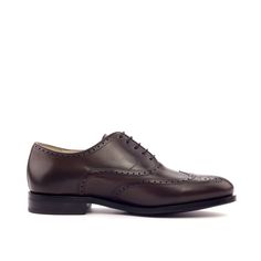 100% Satisfaction Guaranteed Same Workshop As Ferragamo & Louis Vuitton A hand-painted dark brown finish brings a touch of formality to an otherwise business casual shoe. Classic wingtip styling and a closed, oxford-style lacing system makes it easy to dress these shoes up or down. Consider them with anything from heavier weight tan linen suits to mid-grey suits. Or, dress them down with some dark wash denim. Upper: Full-grain Italian leather Sole: Leather sole w/ stacked heel Construction: