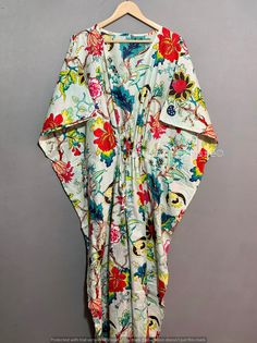 "This Beautiful Indian Cotton Caftan Or Can Be Called As Tunic Is Made With Super Fine Quality Cotton And Designs Have Been Crafted By Hand Prints. Measurements :- Size - Free Size Length - 52 Inches - 54 Inches Bust/Chest Size - 34 inches / 87 cm Fabric - 100% Cotton Pattern - Floral Kaftan Has Adjustable Drawstring Waist To Loose Or Tight , Kaftan Has V Shape Neck Which Is 8\" Inches Deep. Kaftan Is Multi-Purpose And Can Be Worn As A Cover Up At The Beach ,Lounge Wear ,Sleepwear ,Pregnant Wome Multicolor Floral Print Loungewear Dress, Multicolor Floral Print Dresses For Loungewear, Multicolor Floral Print V-neck Sleepwear, Multicolor Floral Print Kaftan For Loungewear, Multicolor Long Summer Sleepwear, Multicolor Floral Print Kaftan With Short Sleeves, Floral Print Short Sleeve Kaftan For Daywear, Short Sleeve Floral Print Kaftan For Daywear, Multicolor Floral Print Short Sleeve Kaftan