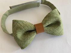 Olive, Sage bow tie and brown PU leather suspenders 1/2” wide and bow tie set.Size 6m-2yo years old suspenders are 29"long. Bow tie measures 3 1/2x2", neck strap is 14 1/2" long.Size 3-6 years old suspenders are 33" long.  Bow tie measures 4x2 1/4", neck strap is 15 1/2" long.Size 7-11 years old suspenders are 37" long. Bow tie measures 4 1/2x2 1/2", neck strap is 16 1/2" long.Size adult suspenders are 55" long.  Bow tie measures 5x 2 3/4", neck strap is 24" long.Please allow me 2-3 days to make Sage Bow Tie, Long Bow, White Face Mask, Leather Suspenders, Burlap Bow, Princess Kids, Bow Tie Set, Burlap Bows, Burlap Fabric