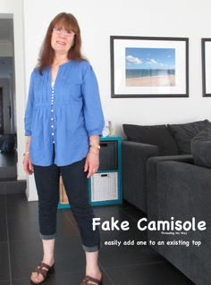 a woman standing in front of a couch with the caption fake camisole easily add one to an existing top