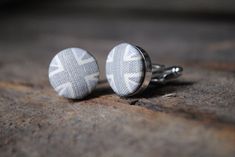 These subtle grey union jack cufflinks create the alternative to the classic red white and blue. These cufflinks are set on a shiny silver setting and measure 2cm across. They are subtle and stunning. You will receive them in a cufflink box and gift wrapped. 3rd Wedding Anniversary, Cufflink Box, Wedding Bottles, 3rd Anniversary Gifts, Leather Coasters, Stocking Filler Gifts, Personalized Anniversary Gifts, Tie Clips, Personalized Anniversary