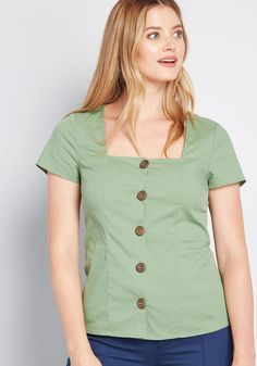 Design your space to be cozy and quaint so that your entering the scene in this short-sleeved blouse is the finishing touch ! A woven, cotton-blend top from our ModCloth namesake label, this green separate touts flattering tailoring, a square neckline, dark wood buttons decorating the front, and ties in the back. What a dream ! 75% Cotton, 21% Nylon, 4% Spandex. Hand wash. Front button closure. Imported Model is wearing size: 1X S Fabric provides stretch. S=24 inches Length 1X=28 inches Length | Vintage Style Swimwear, Modest Top, Outfit Office, Casual Dresses Plus Size, Fashion Girly, Midi Dress Plus Size, Girly Outfit, Teacher Clothes, Dream Closets