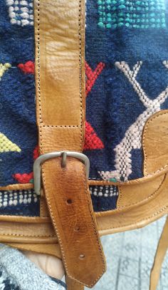 "Welcome! A kilim shoulder bag Material: leather Some signs of use (some stain, imperfecto on and small hole un strap that needs sew) but in good condition. Interior needs some restauration. Strong Material. Really good quality leather. Adjustable Straps. Measures: 11.41\" (29 cm) x 9.05\" (23 cm) Straps: 45.66\" (116 cm) Thanks for stopping by!!IMPORTANT: Due to the delicate situation We're all going through, and in order to keep the safety of courier workers too, all orders will be dispatched Artisan Saddle Bag With Adjustable Strap For Travel, Bohemian Bags With Leather Trim, Bohemian Hand-stitched Crossbody Satchel, Bohemian Saddle Bag Satchel With Adjustable Strap, Bohemian Satchel Saddle Bag With Adjustable Strap, Bohemian Handmade Saddle Bag For Travel, Bohemian Shoulder Bag With Leather Trim, Bohemian Brown Saddle Bag With Adjustable Strap, Brown Bohemian Saddle Bag For Travel