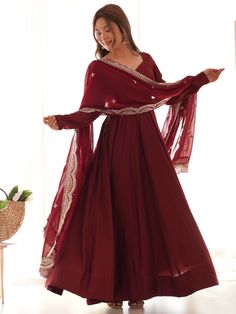 Our glamorous maroon silk festival wears anarkali suit pants with a dupatta. This beautifully crafted outfit features a maroon color silk anarkali suit with a similar color silk pant and georgette dupatta. The dupatta is adorned with intricate embroidered work, sequin work, and cutwork border for an elegant touch. This fully stitched outfit comes in sizes ranging from XS to XXL, ensuring a perfect fit for all body types. The 5.5-meter gown flair and 2.2-meter-long dupatta add a flowy and luxurious feel to the ensemble. Whether you're attending festivals, functions, or events, this maroon anarkali pantsuit is a versatile choice that will make you stand out. Anarkali Gown, Suit Pant, Anarkali Suit, Ethnic Wear, Festival Wear, Anarkali, Festival, Silk, Fabric