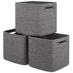 three grey baskets stacked on top of each other