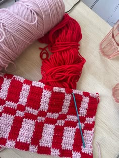 yarn and crochet are sitting on a table