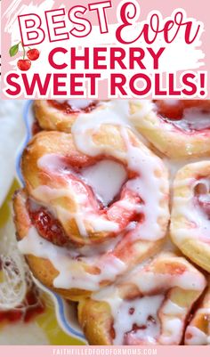 the best ever cherry sweet rolls with icing and strawberries on top are ready to be eaten