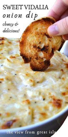 a hand dipping some bread into a bowl of dip with the words sweet vidalla onion dip