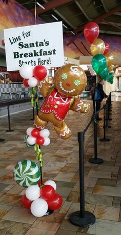 some balloons that are in the shape of a gingerbread man