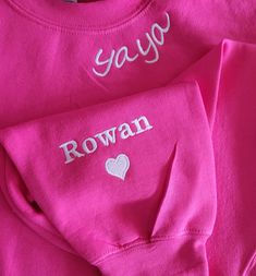 Welcome to Embroidery Kings, Personalized Embroidered Yaya sweatshirt, Grandma, Gigi Sweatshirt, Nana Sweatshirt with Grandkids Names on sleeve, Grandma Gift, Mothers Day How to order: 1. Choose the sweatshirt color 2.Choose the Sweatshirt Size 3. Add your personalization.  Material: -50% Cotton, 50% Polyester -Unisex heavy blend -Medium-heavy fabric Care instructions: -DO Not Dry-clean. Machine cold wash, inside out, with like colors. Only non-chlorine bleach. -Tumble dry low heat -Medium iron. Pink Long Sleeve Hoodie With Embroidered Text, Pink Long Sleeve Hoodie With Custom Embroidery, Pink Crew Sweatshirt With Embroidered Graphics, Pink Long Sleeve Sweatshirt With Custom Embroidery, Pink Long Sleeve Sweatshirt With Embroidered Text, Family Matching Embroidered Long Sleeve Sweatshirt, Long Sleeve Tops With Custom Embroidery As Gift, Pink Top With Embroidered Text As Gift, Long Sleeve Pink Top With Embroidered Text