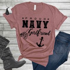 Navy Girlfriend Shirt, Military Girlfriend, Navy Girlfriend Gift, Anchor, Sailor Shirt, USA, Proud Navy Girlfriend, Navy Shirt Women  This printed design has been placed on a Bella Canvas 3001 t-shirt. The Bella Canvas unisex jersey 3001 features a crew neck with short sleeves. This shirt is super soft, lightweight, incredibly comfortable, and easy to maintain. This brand of t-shirt also breathes very well and has the perfect amount of stretch. It is very diverse in the fact that it looks great on several different body types and it is also flattering on both men and women. UNISEX SIZING * Please refer to the above sizing charts before ordering. Both sizing charts are located in the pictures above. Always measure your favorite t-shirt (that fits you best) before ordering  * These unisex t- Proud Navy Girlfriend, Navy Girlfriend, Girlfriend Shirt, Military Girlfriend, Sailor Shirt, Girlfriend Shirts, Girlfriend Gift, Navy Shirt, Shirt Women