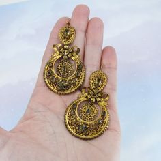 "These earrings are beyond exquisite, BEYOND. I encourage you to zoom way in on the pics and look at the absolutely incredible metal work on these beauties, it is phenomenal. Made circa 1850, very possibly earlier, these earrings are done in the pendeloque style popularized in the mid-1700's. Bezel set foil-backed citrines sit atop hand sawn scrolling metalwork that is full of fine detail. And as if things couldn't get any better, these are also day/night! And they're not just day/night with two Victorian Style Ceremonial Earrings For Pierced Ears, Victorian Style Ceremonial Dangle Earrings, Antique Earrings With 17 Jewels For Ceremonial Occasions, Antique Gold Earrings With Historical Design, Victorian Hallmarked Earrings For Ceremonial Occasions, Victorian Gold Plug Earrings, Yellow Gold Earrings With Historical Design As Gift, Antique Filigree Earrings For Ceremonial Occasions, Victorian Brass Earrings For Ceremonial Use