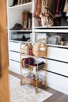 the closet is full of shoes and purses, including one with a shopping cart