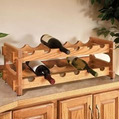 a wooden wine rack with bottles on it and the words seek for easy woodworking techniques