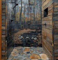 a walk in shower sitting next to a lush green forest filled with trees and leaves