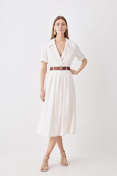 An Ode To Sophistication And Timeless Design, Soft Tailoring Immerses This Dress With Short Sleeves, A Notched Collar And Waist Belt Adding Touches Of Refinement Above And A Graceful Skirt That Flows To A Midaxi Hemline Below. Perfect For Emanating Poise At Professional Events And Special Occasions Alike.Soft Tailoringshort Sleevednotched Collar And Waist Belt One Piece Dress With Belt, Belt On Waist Outfit, Wear A Belt With A Dress, Feminine Capsule Wardrobe Fall, Waist Belt Outfit Dress, Summer Work Dresses Office Wear, Necklines For Broad Shoulders, Belt Styling, Soft Summer Dress