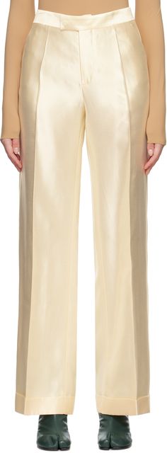 Viscose and silk-blend satin trousers. · Two-pocket styling · Zip-fly · Creased legs · Rolled cuffs · White stitching at back waistband Supplier color: Vanilla Silk Wide Leg Pants With Pressed Crease, Silk Wide Leg Bottoms With Pressed Crease, Silk Wide-leg Bottoms With Pressed Crease, Silk Straight Leg Bottoms With Pressed Crease, Silk Wide-leg Pants With Pressed Crease, Silk Tapered Leg Bottoms With Pressed Crease, Silk Trousers With Pressed Crease, Silk Ankle Pants For Work, Elegant Viscose Pants With Pockets