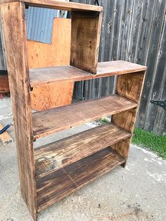 an old book shelf is being turned into a shelving unit with wood slats