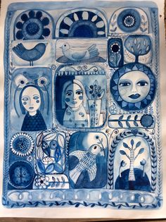 a blue and white painting with many different faces