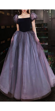 Discover the perfect gown for your next formal event. This elegant navy blue and purple tulle dress, featuring romantic puff sleeves and a flowing skirt, is ideal for galas, weddings, and special occasions. Elevate your evening wardrobe with this enchanting design that promises both beauty and comfort. Perfect whimsical fairytale fairycore enchanted fairy fantasy mascarade outfit idea for glamorous nights Purple Tulle Evening Dress For Banquet, Purple Ball Gown For Banquet, Princess Style Ball Gown Evening Dress, Purple Ball Gown Evening Dress For Prom, Purple Tulle Ball Gown For Banquet, Lavender Evening Dress For Prom Banquet, Lavender Evening Dress For Banquet And Prom Season, Purple Floor-length Ball Gown For Prom Season, Purple Floor-length Ball Gown For Prom