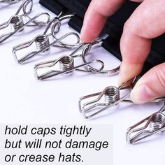 a person is trying to fix some kind of item with scissors and clips on it