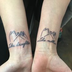 two people with matching tattoos on their arms that say life is beautiful and like never