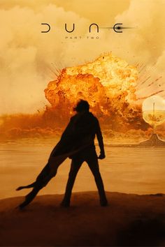 a movie poster for dune with a man holding a dog in front of an explosion