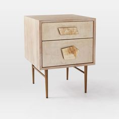 a small wooden table with two drawers on one side and an open drawer on the other