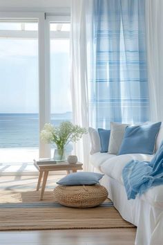 a living room with blue and white decor