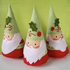 three little christmas gnomes with green hats